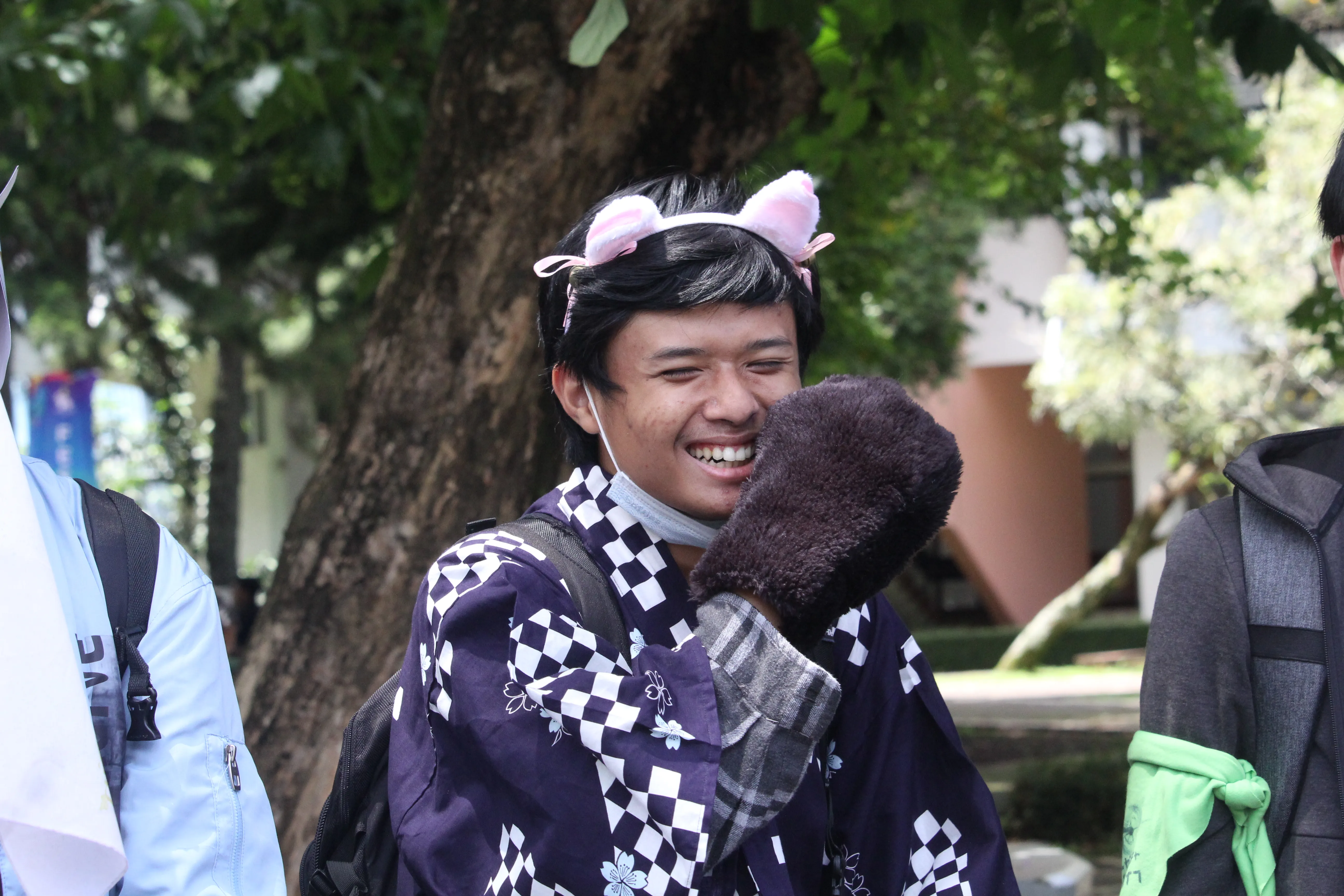 Wearing a yukata and cat-like accessories at Takeshi